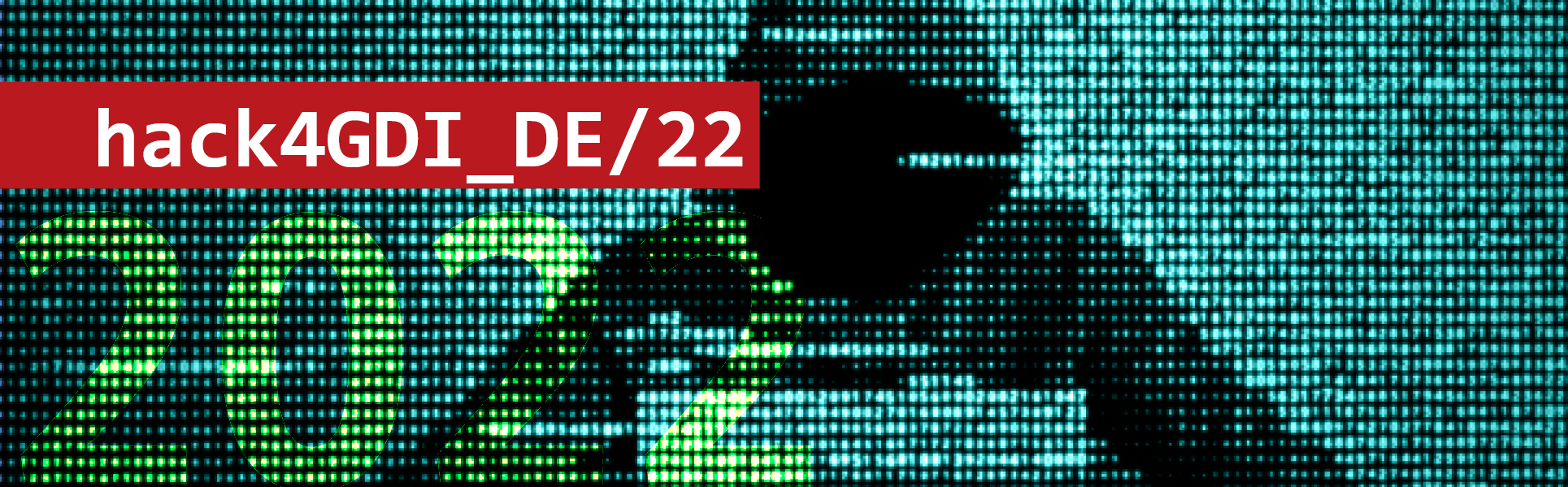 Person mit Hoodie vor Laptop